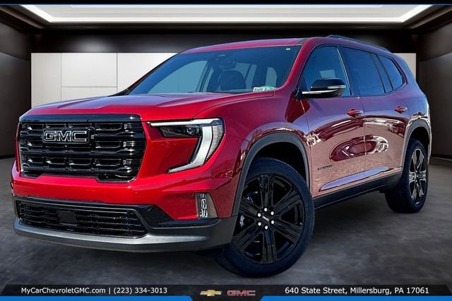 2026 GMC Acadia Elevation in Volcanic Red Tintcoat — front three-quarter view