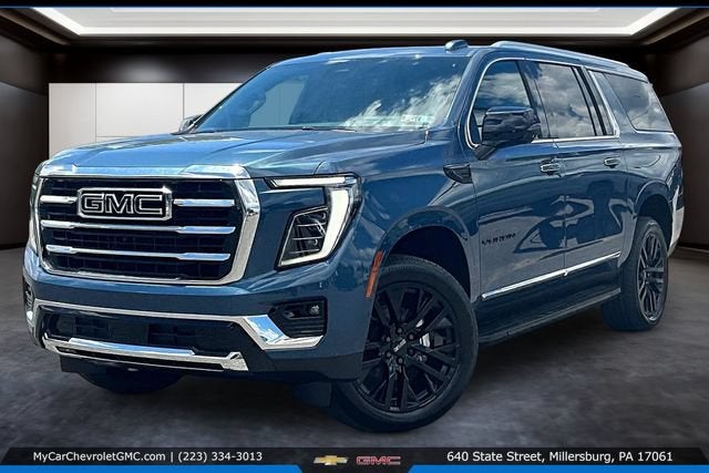 2026 GMC Yukon XL Elevation in Downpour Metallic — front three-quarter view