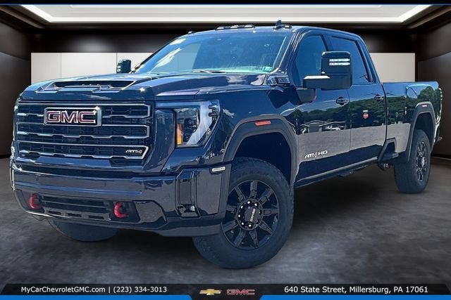 2026 GMC Sierra 3500 HD AT4 in Titanium Rush Metallic — front three-quarter view