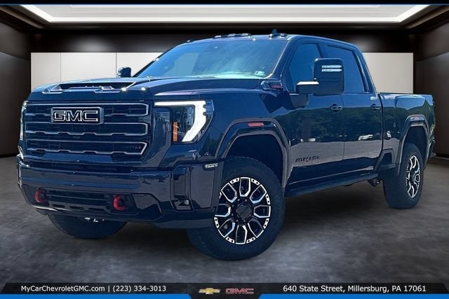 2026 GMC Sierra 3500 HD AT4 in Titanium Rush Metallic — front three-quarter view