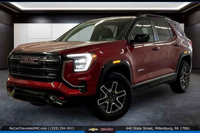 2026 GMC Terrain AT4 in Volcanic Red Tintcoat — front three-quarter view